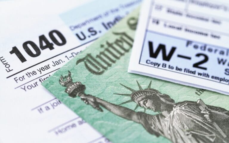 Tax forms 1040 and W-2 with check image