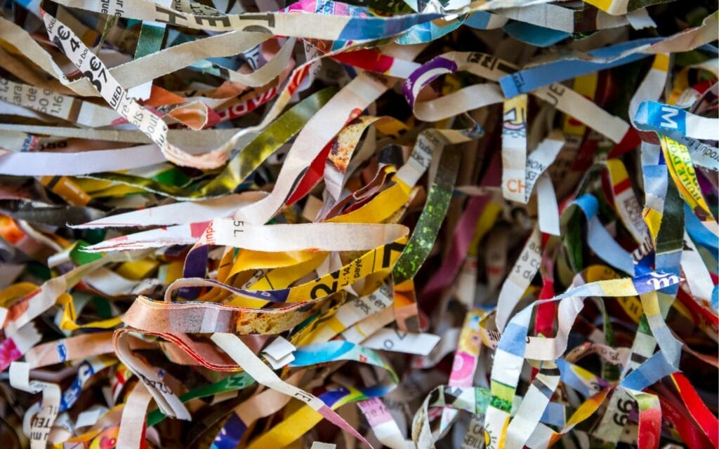 Colorful shredded paper strips close-up
