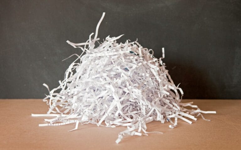 Pile of shredded paper on desk