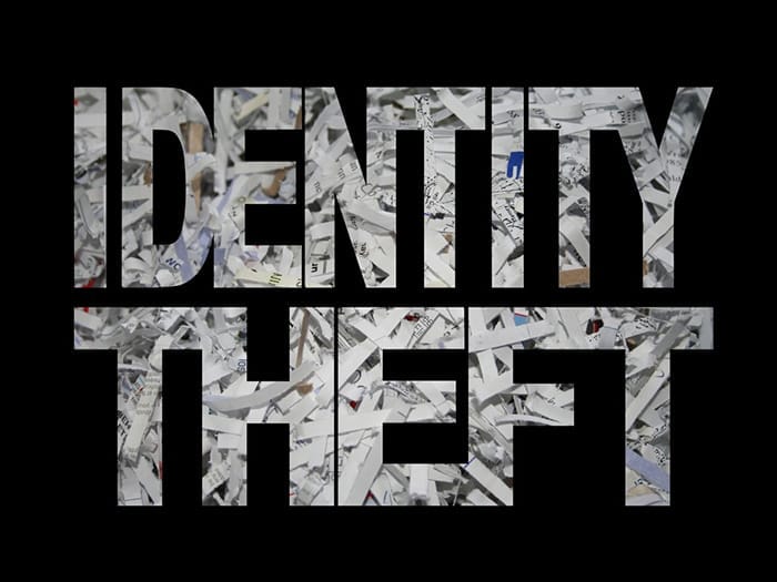 Identity theft concept with shredded paper